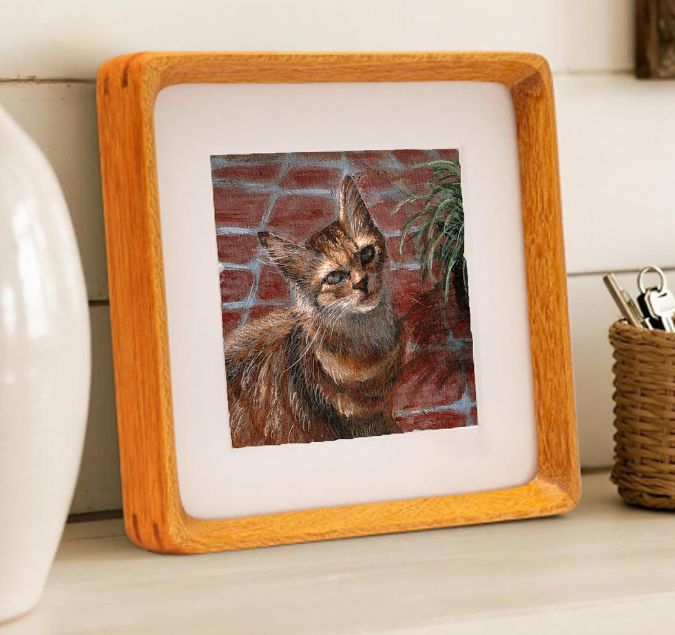 Thumbnail: Framed painting of a curious tabby cat with large ears, brick background.