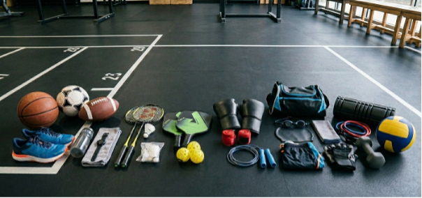 A line up of exercise equipment on a gym floor