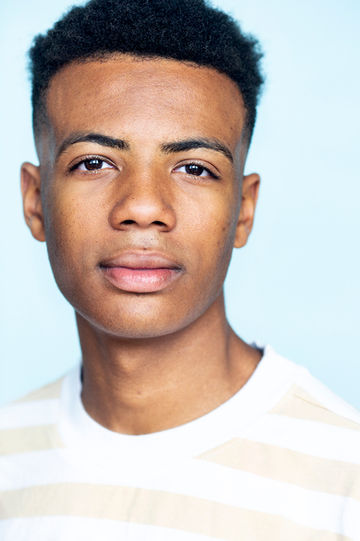 Chicago actor headshot with soft natural lighting and neutral background — Gretchen Kelley Photography