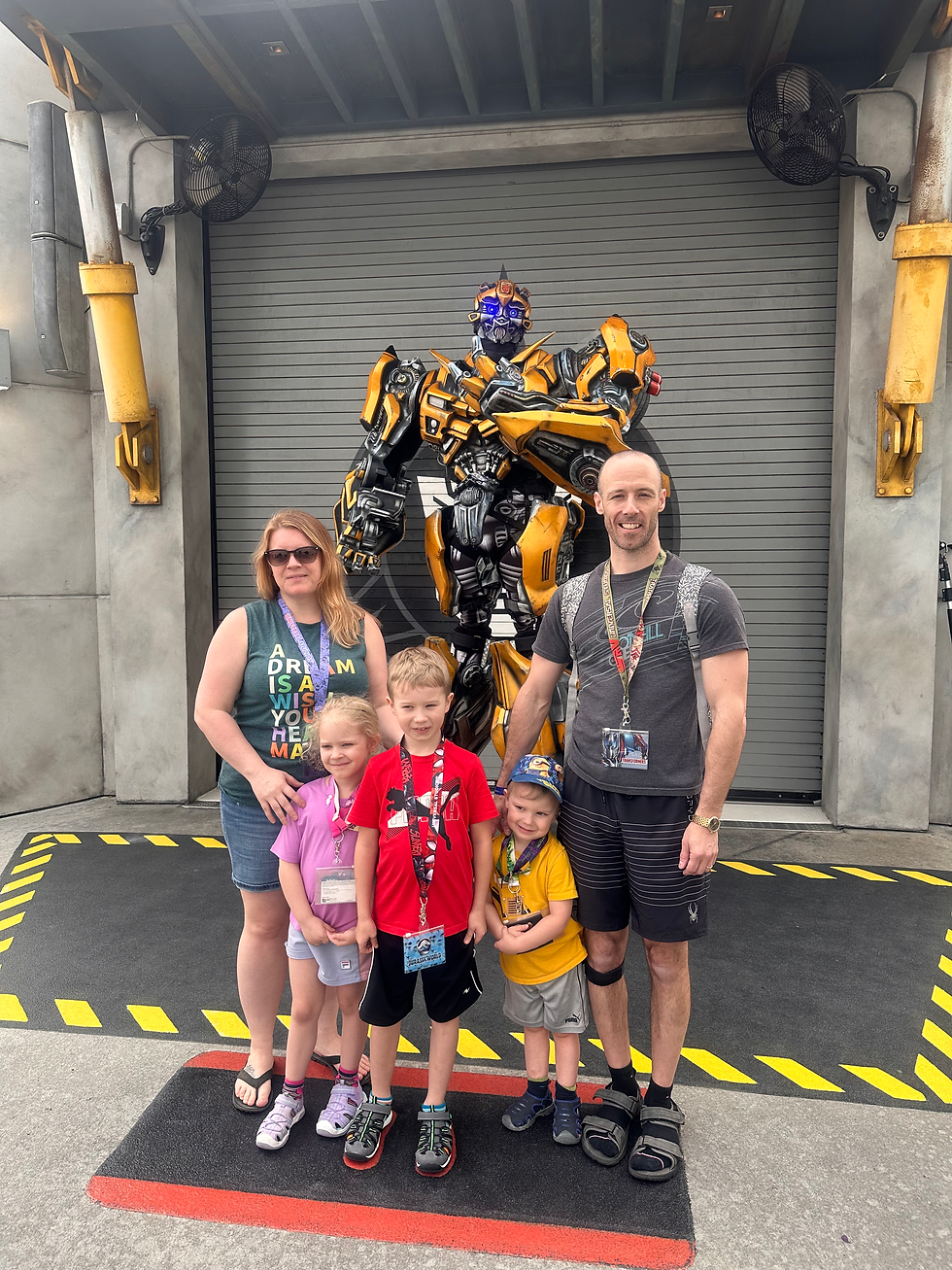 Posing with BumbleBee at Universal Studios in Orlando