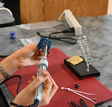 Image of hands soldering
