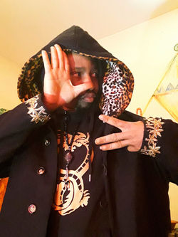 'MALAK' CUSTOM WOOL COAT.