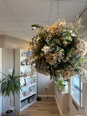 salon reception with flower cloud