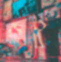 An American Diner filled with Americana. It has a statue of Wonder Woman standing with her hands on her hips on the right of the image. It has a bust of Superman below an image of a nean pegasus.