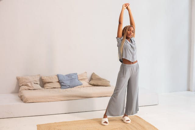 A person stretching her arms