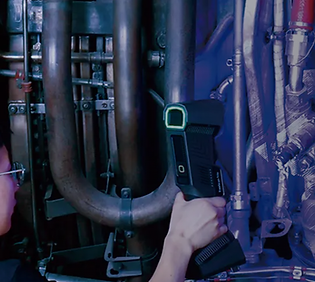 A man performing 3D scanning in progress