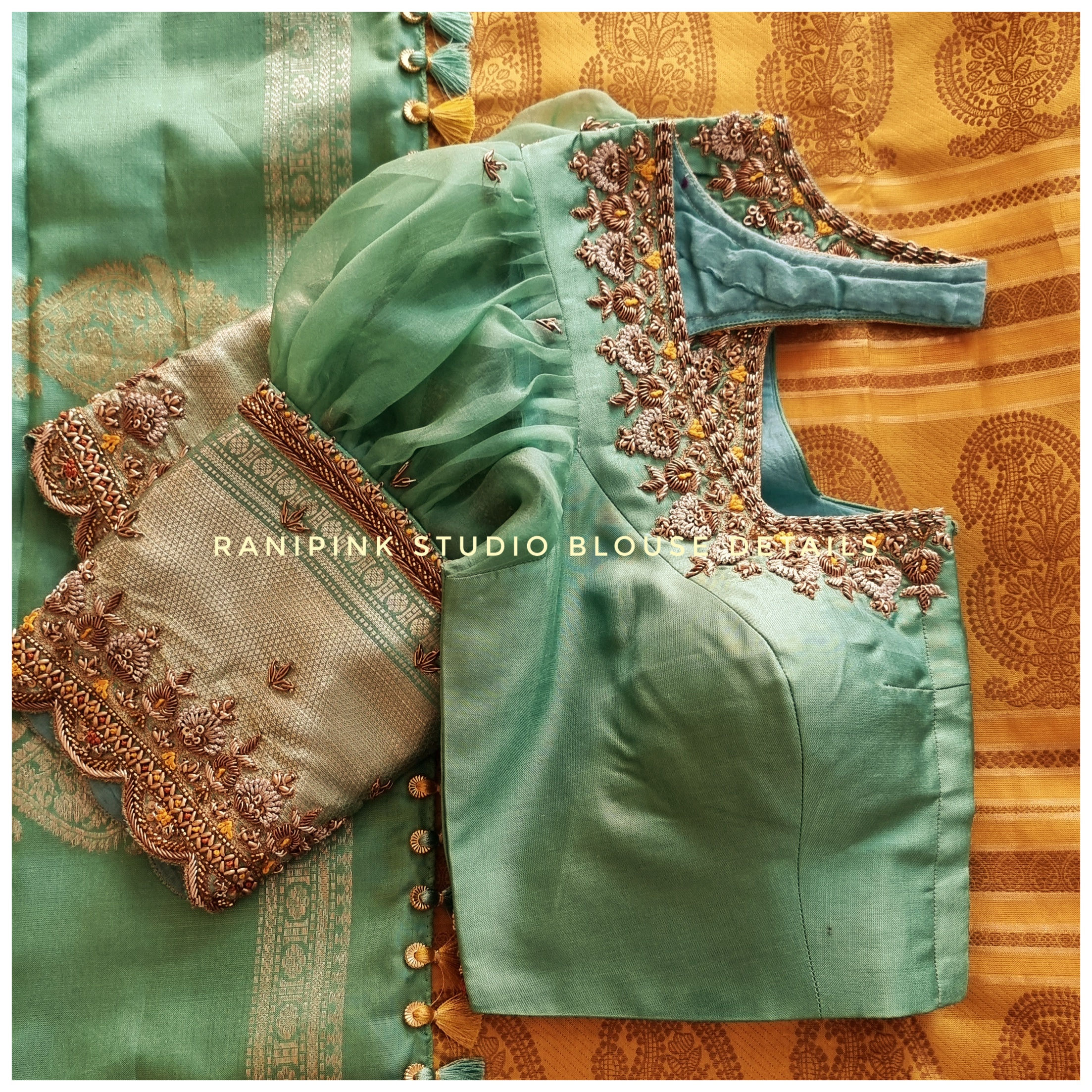 Intricately embroidered kanjivaram silk saree blouse with organza puff sleaves