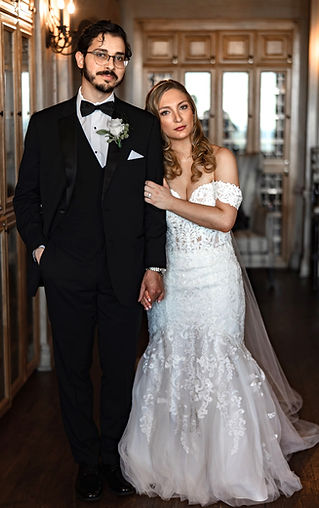 Bride and grrom posing in Capital City Club in Montgomery, Alabama 