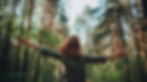 free-woman-breathing-clean-air-nature-forest-happy-girl-from-back-with-open-arms-happiness