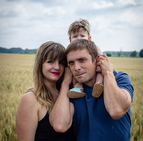 Family photo in a fildof wheat