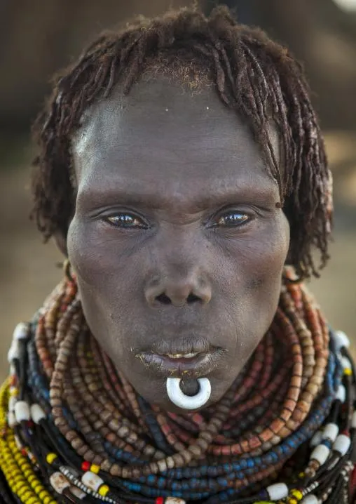 Nyangatom woman wearing layered bead necklaces