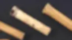 Wooden stretching plugs used by the Suri after the initial lower lip piercing. The plugs keep the incision open while it heals and are gradually replaced with larger sizes before a decorative lip plate can be worn.