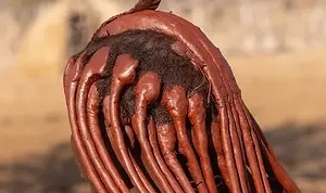Otjize is a paste made from red ochre pigment and animal fat