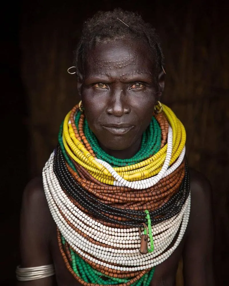 Nyangatom woman wearing layered bead necklaces