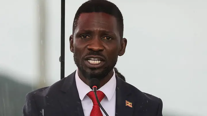 Bobi Wine says he left Uganda for safety after the disputed Jan. 15 vote and will lead his party from abroad until he can return.
