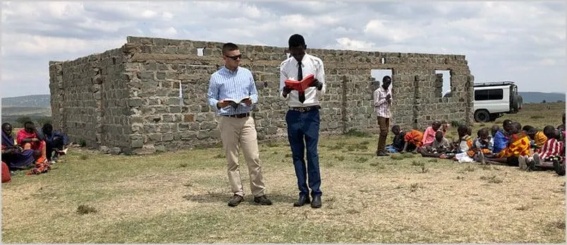 A Maasai reads the bible 