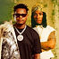 Bruce Melodie and Joeboy in 'Beauty on Fire' cover art, showcasing vibrant Afropop aesthetics from Rwanda and Nigeria