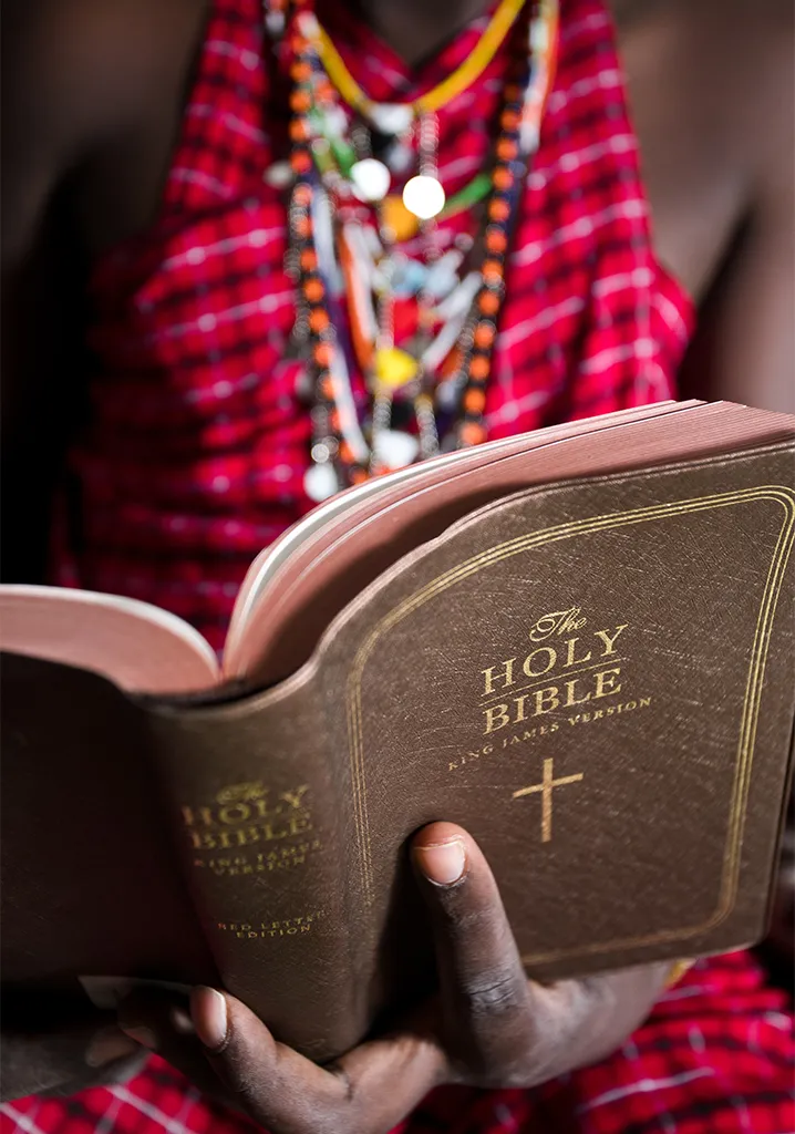 A Maasai reads the bible 