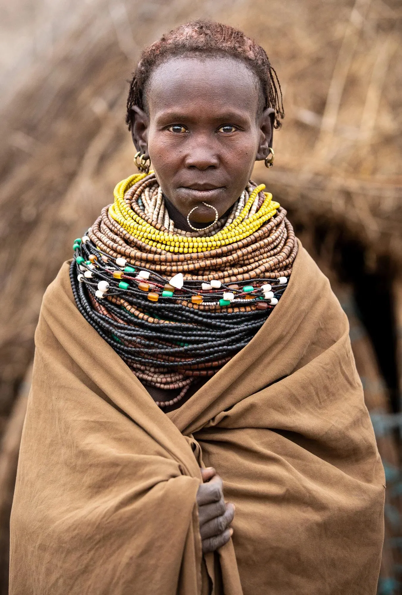 Nyangatom woman wearing layered bead necklaces