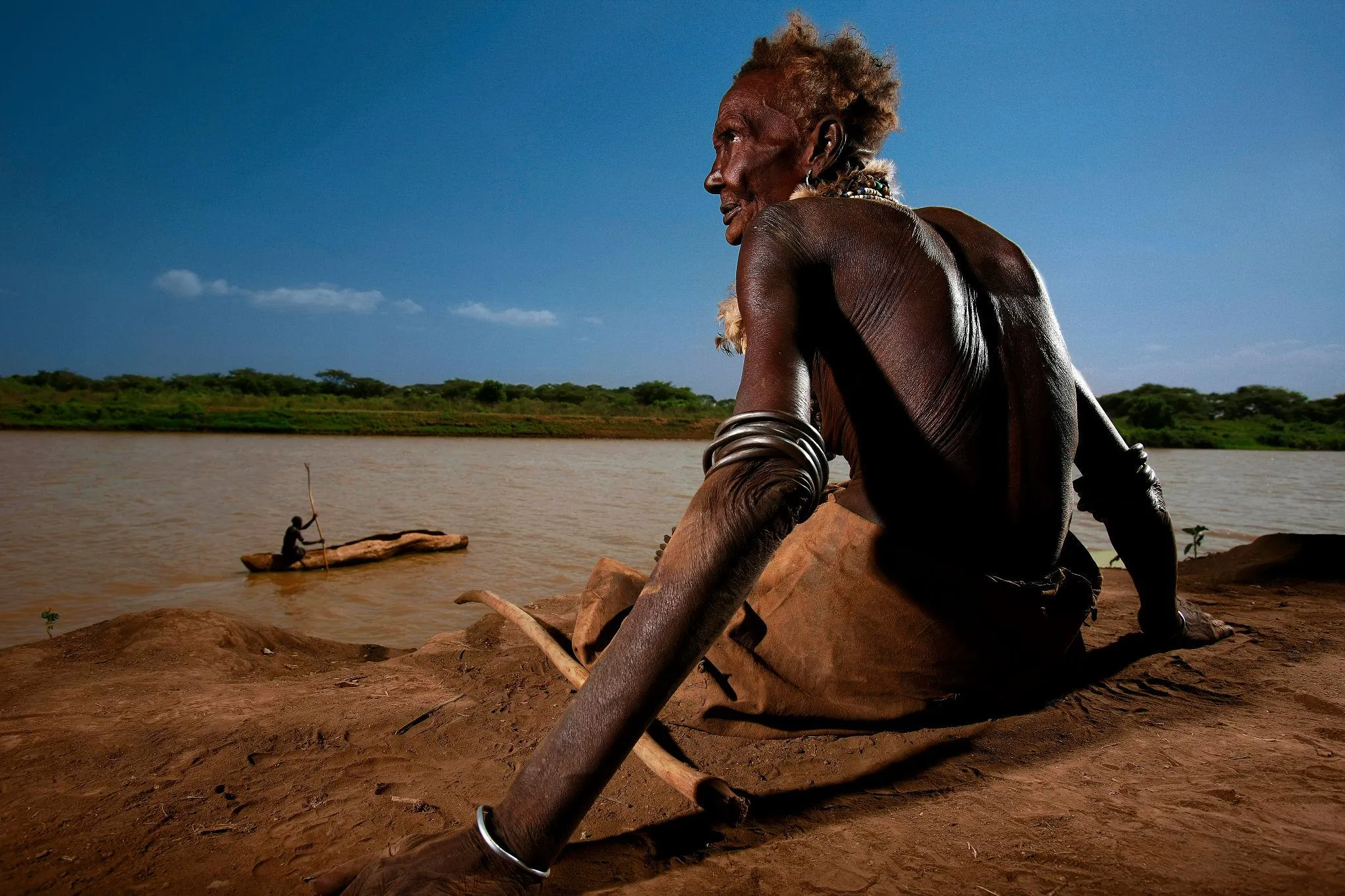 Elderly Daasanach woman overlooking the Omo River in Ethiopia's Lower Omo Valley