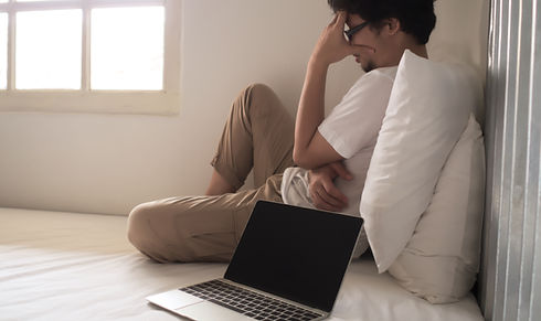 Stressed exhausted young Asian man with