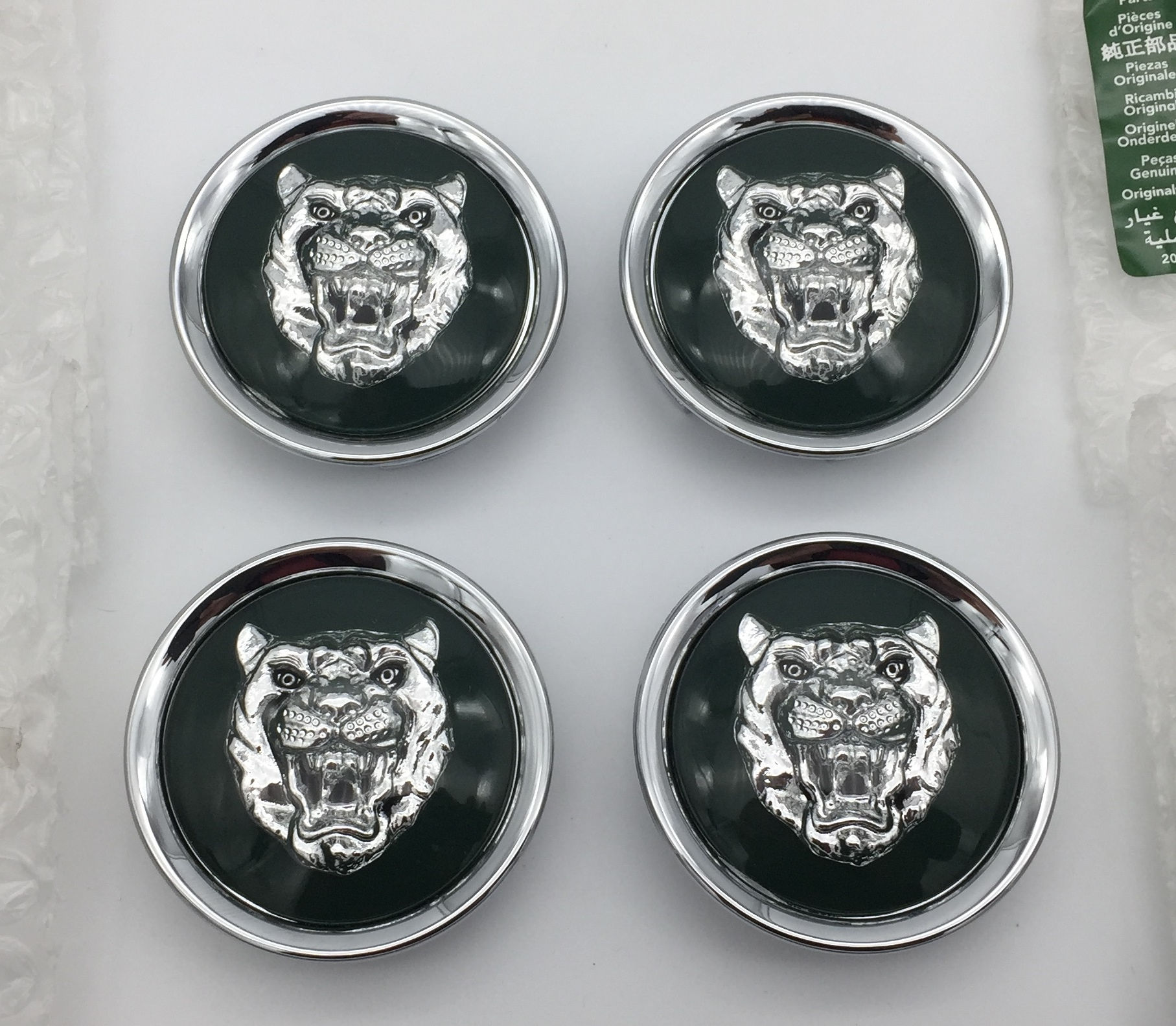 Centre Cap Badges - Green with Silver Growler. Set of 4