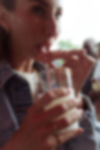 Lady drinking frozen margarita
