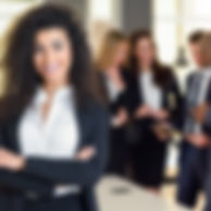 businesswoman-leader-in-modern-office-with-businesspeople-workin.jpg