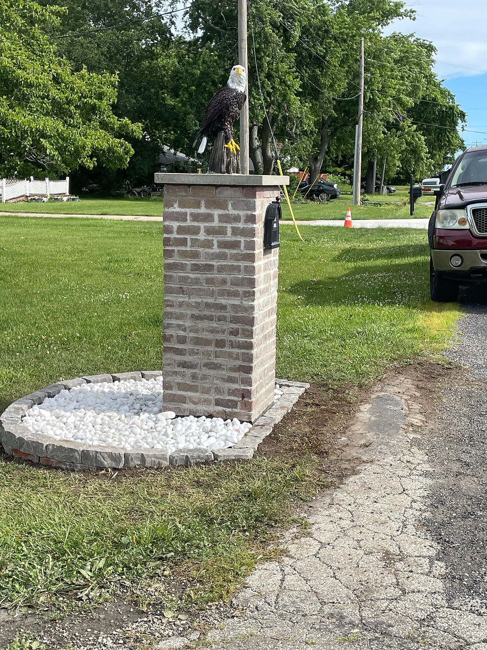 Decorative stone under mailbox