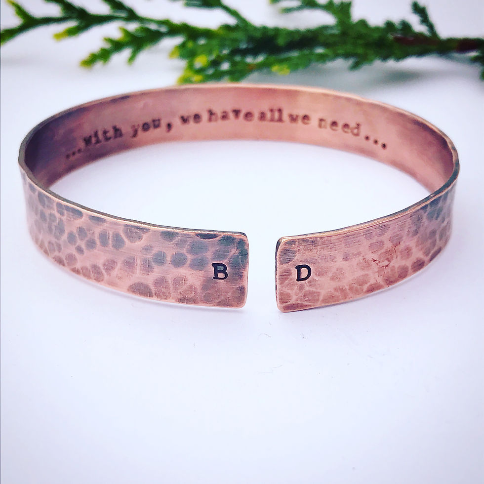 Thumbnail: Close-up of engraved message on copper cuff bracelet