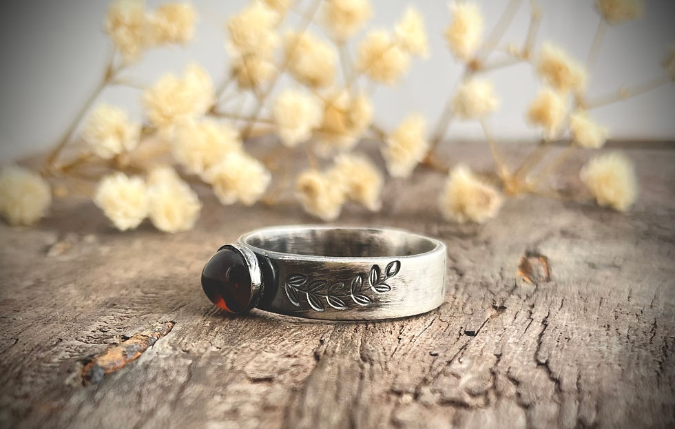 Thumbnail: Nature-inspired silver ring with blue chalcedony gemstone photographed on rustic wooden surface.