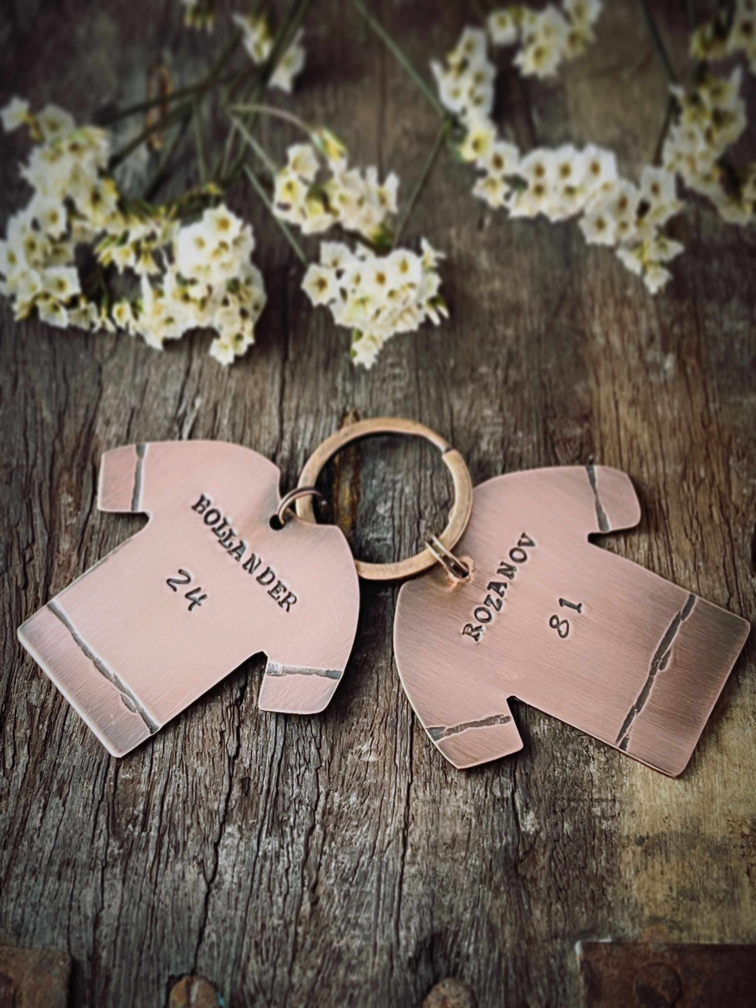 Personalised heated rivalry copper keyrings engraved with names or initials