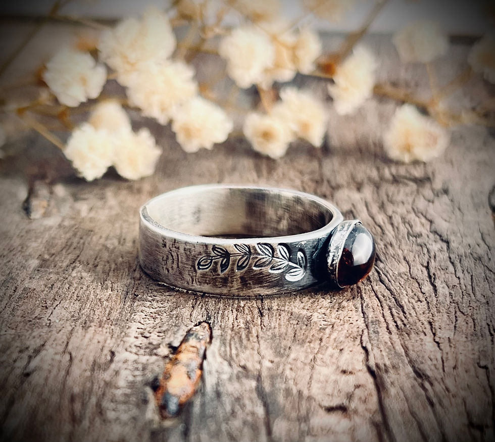 Thumbnail: Sterling silver chalcedony ring showing textured handcrafted detail and round blue gemstone centre.