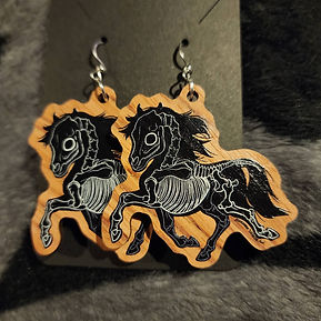 skeleton pony earrings