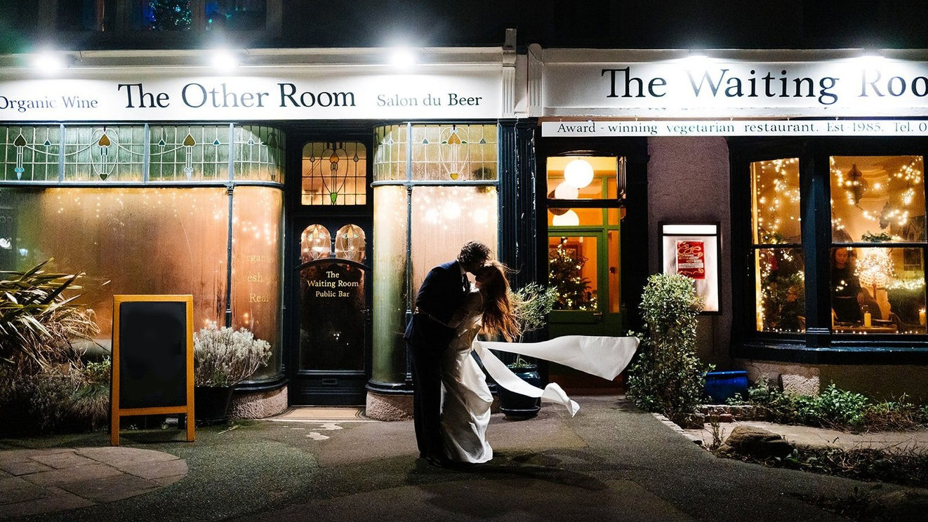 wedding photograph in front of restaurant