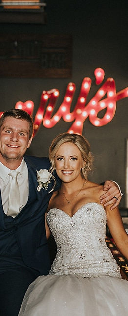brittany mccoy photography nebraska wedding reception restaurant sign smile