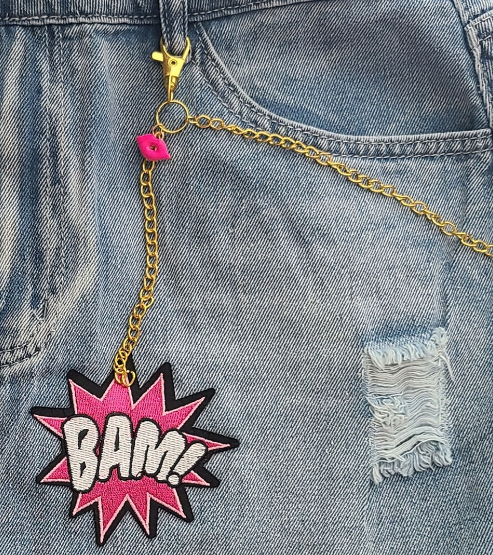 Thumbnail: Little Miss Drama Concert Denim Skirt - Close up of front chain