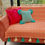 थंबनेल: Orange White Aztec Sofa Cover with Aqua Tassels