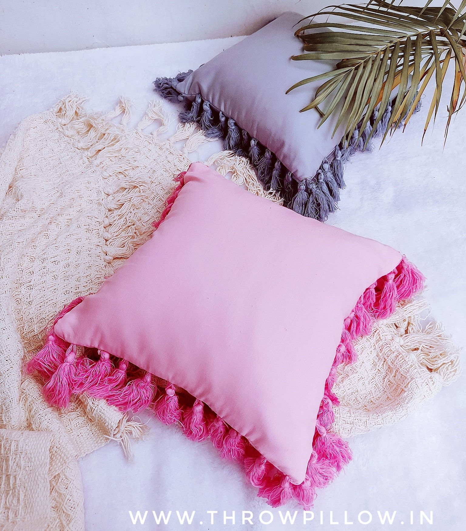 All round tassel cushions