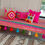 थंबनेल: Rainbow Multicolored Festive Aztec Pattern Sofa Cover with Tassels for Diwali Decoration