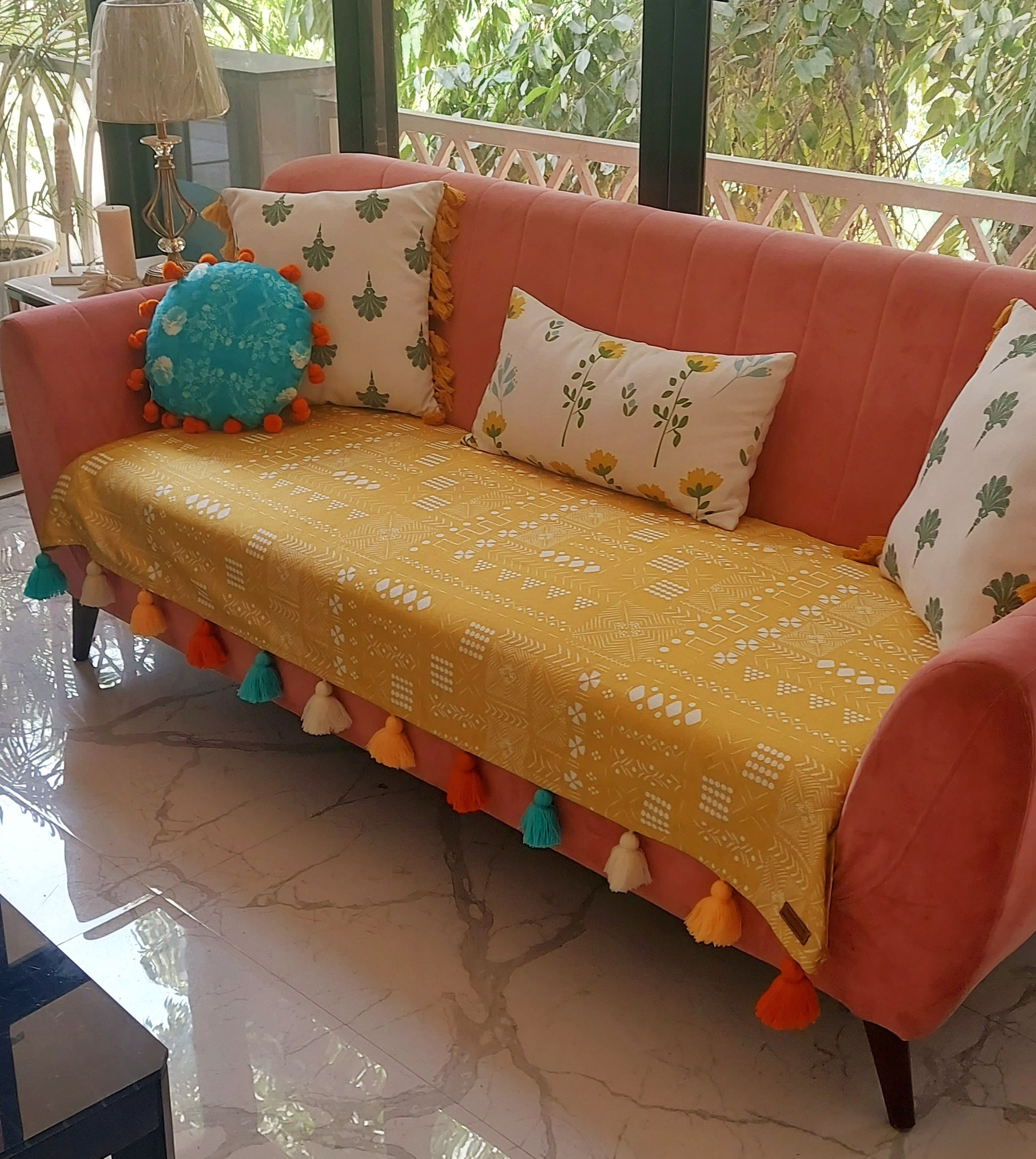 Stylish boho tassel sofa cover, designed to refresh your living room decor with modern and vibrant tribal patterns.