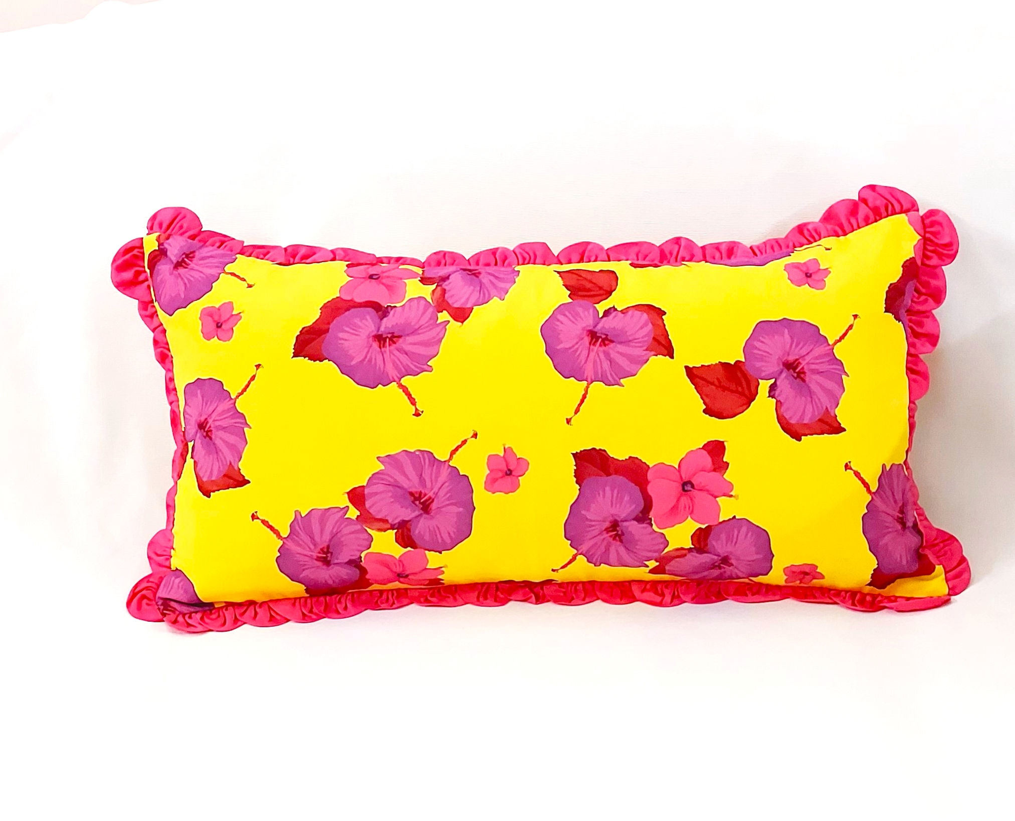 pink and yellow throw pillows