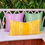 थंबनेल: "Stylish mustard yellow bird trail cushion in a living room"
