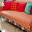 थंबनेल: Durable Sofa Protector with Stylish Tassels