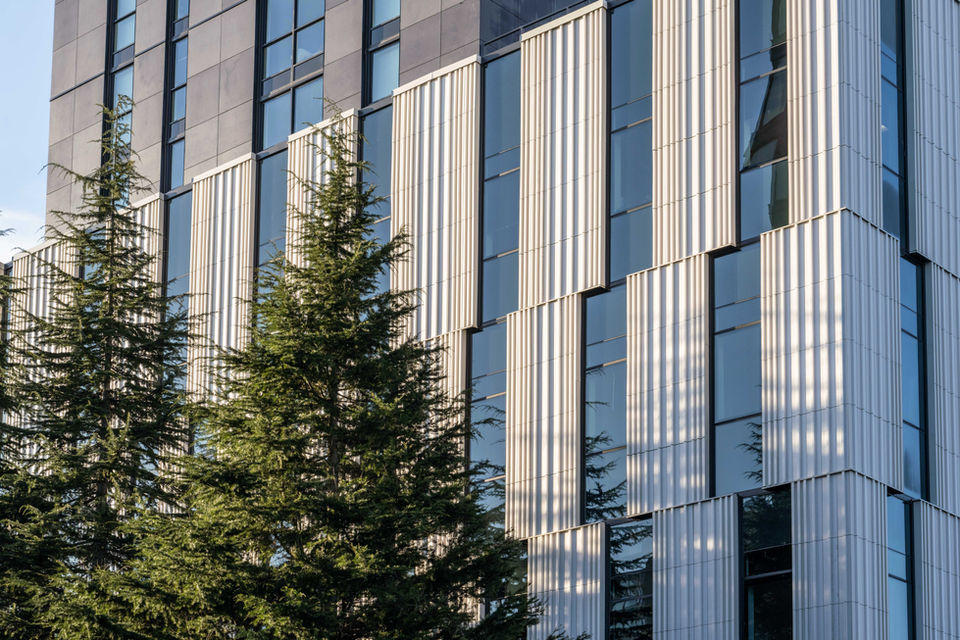 Image of a building with a terracotta rainscreen