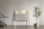 Modern LG TV with fabric cover partially covering screen