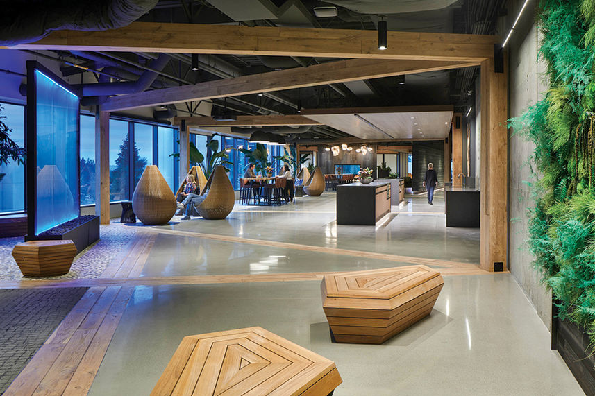 interior of modern office building open space with custom bench seating, pod chairs, Pacific Northwest industrial style
