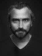 Black and white portrait of designer Alessandro Munge judge GRAY Awards
