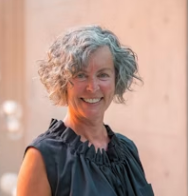 portrait of Nancy Bendtsen of Inform Interiors against a blush pink background