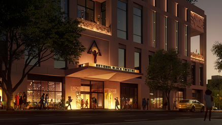 theatre lit up at night Art Deco style people walking in